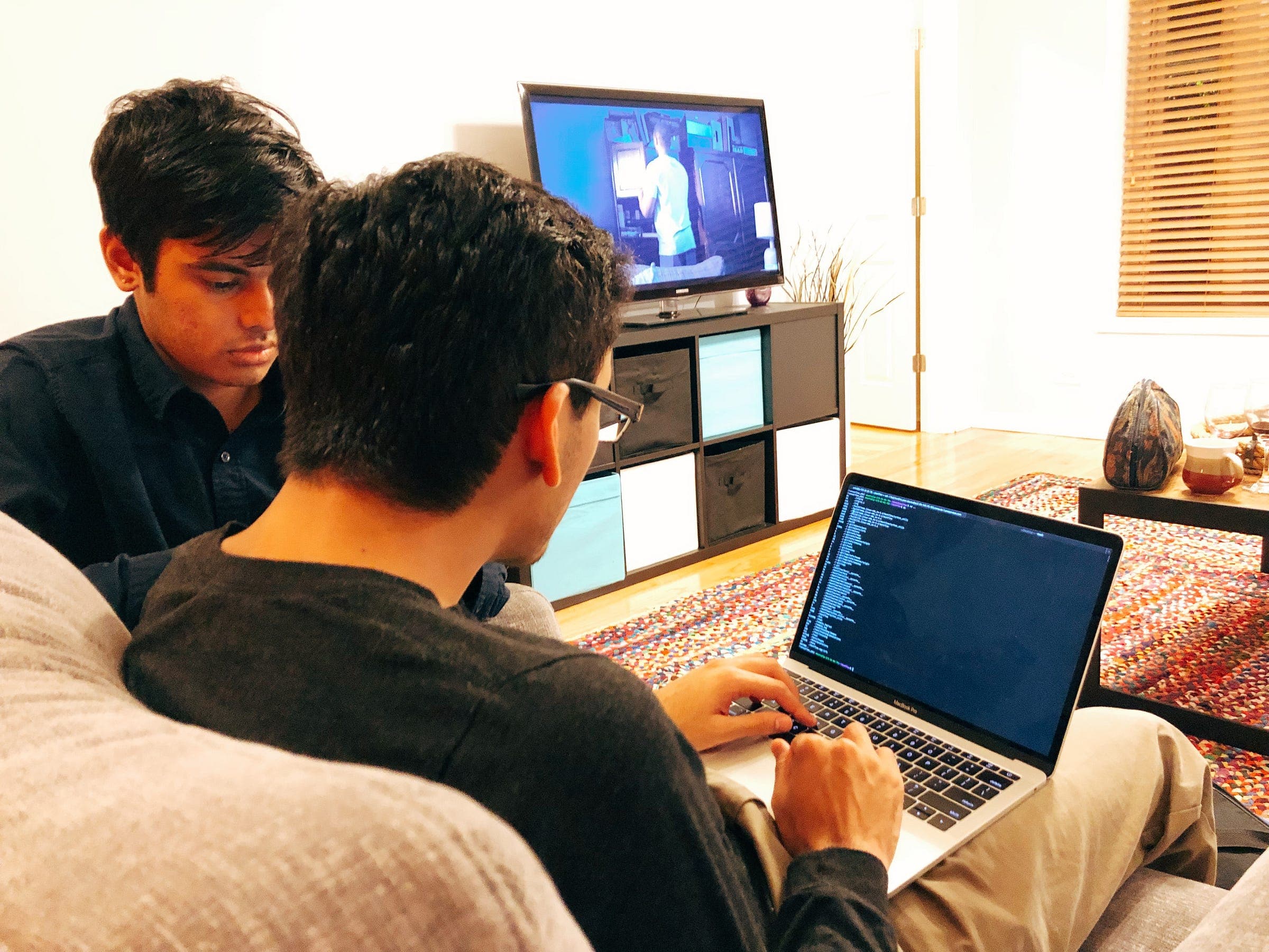 Anshul and Vishal training the model at the Airbnb
